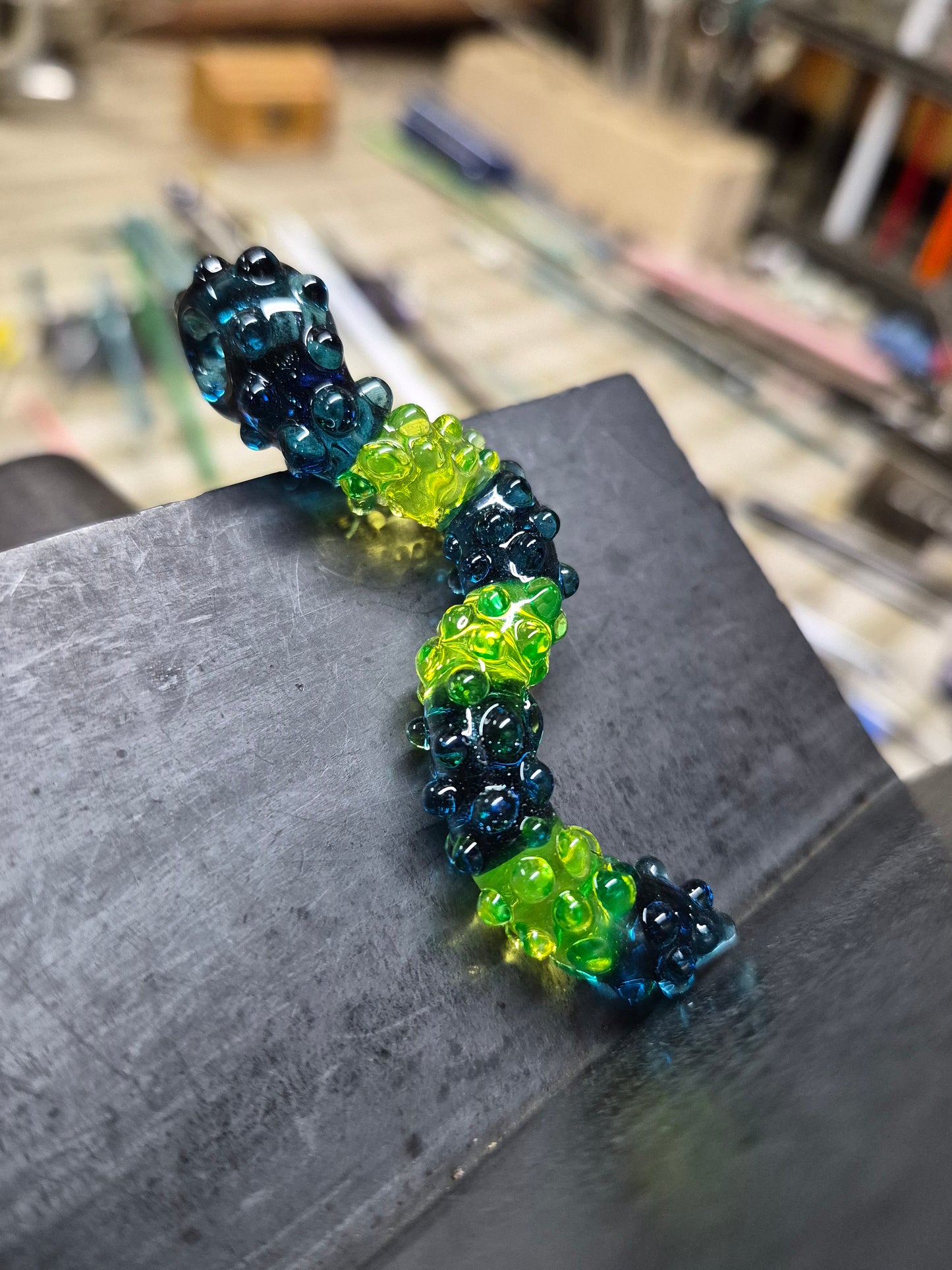 Bumpy Sensory Pendant - Blue Stardust and Green Ion UV Bumpy Sensory Gummy Worm Penant